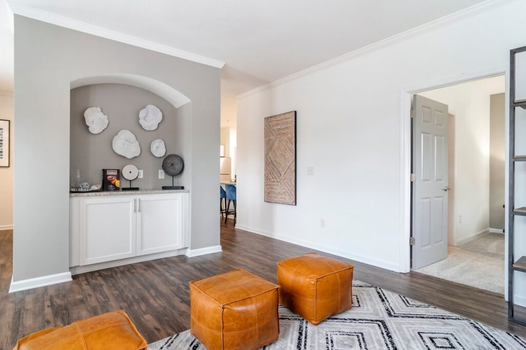 Model living room with built in shelves and cabinets