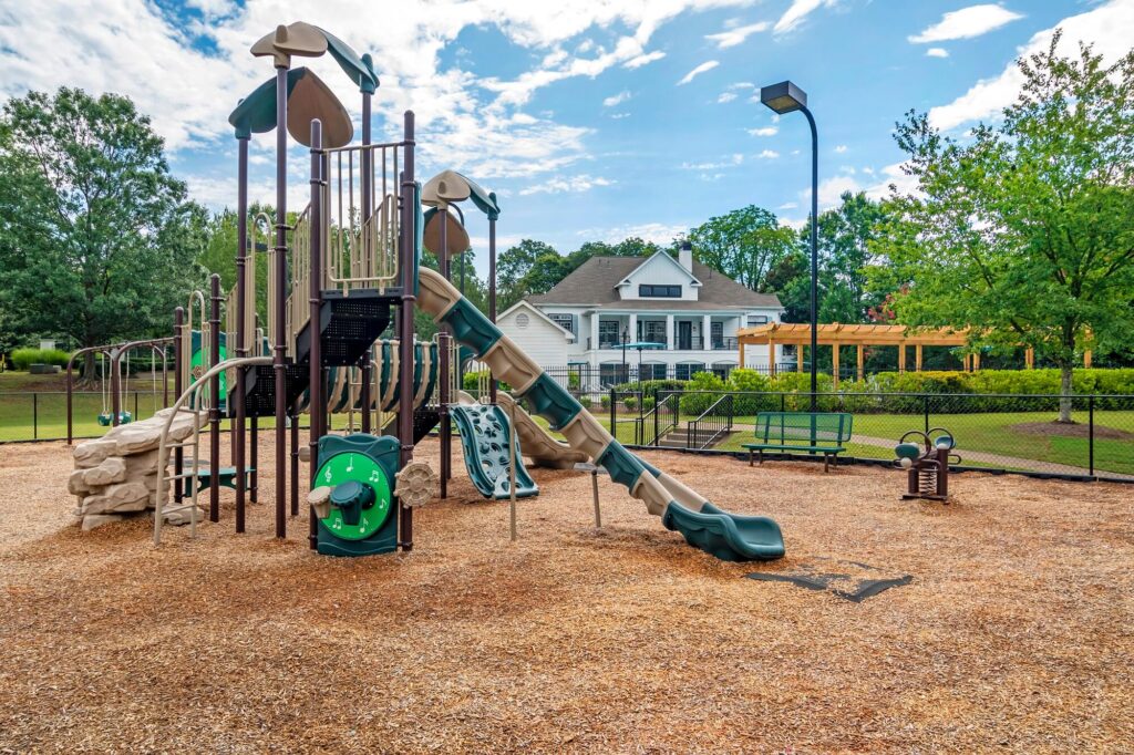 Children's playground with slides, climbing, and see saws