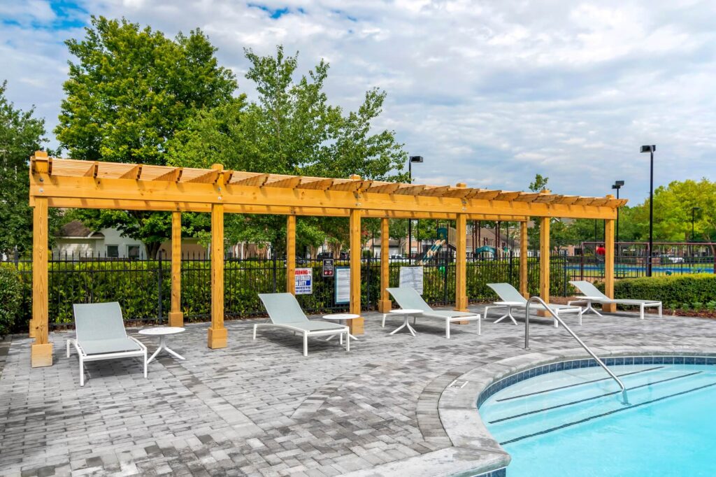 Covered deck seating by the pool